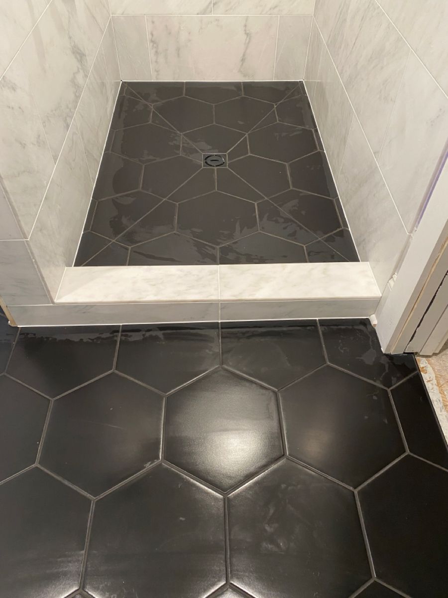 15 Black Hexagon Tile Bathroom Floor Ideas With Bold Pattern - 6. Large Format Hexagon Tiles 1