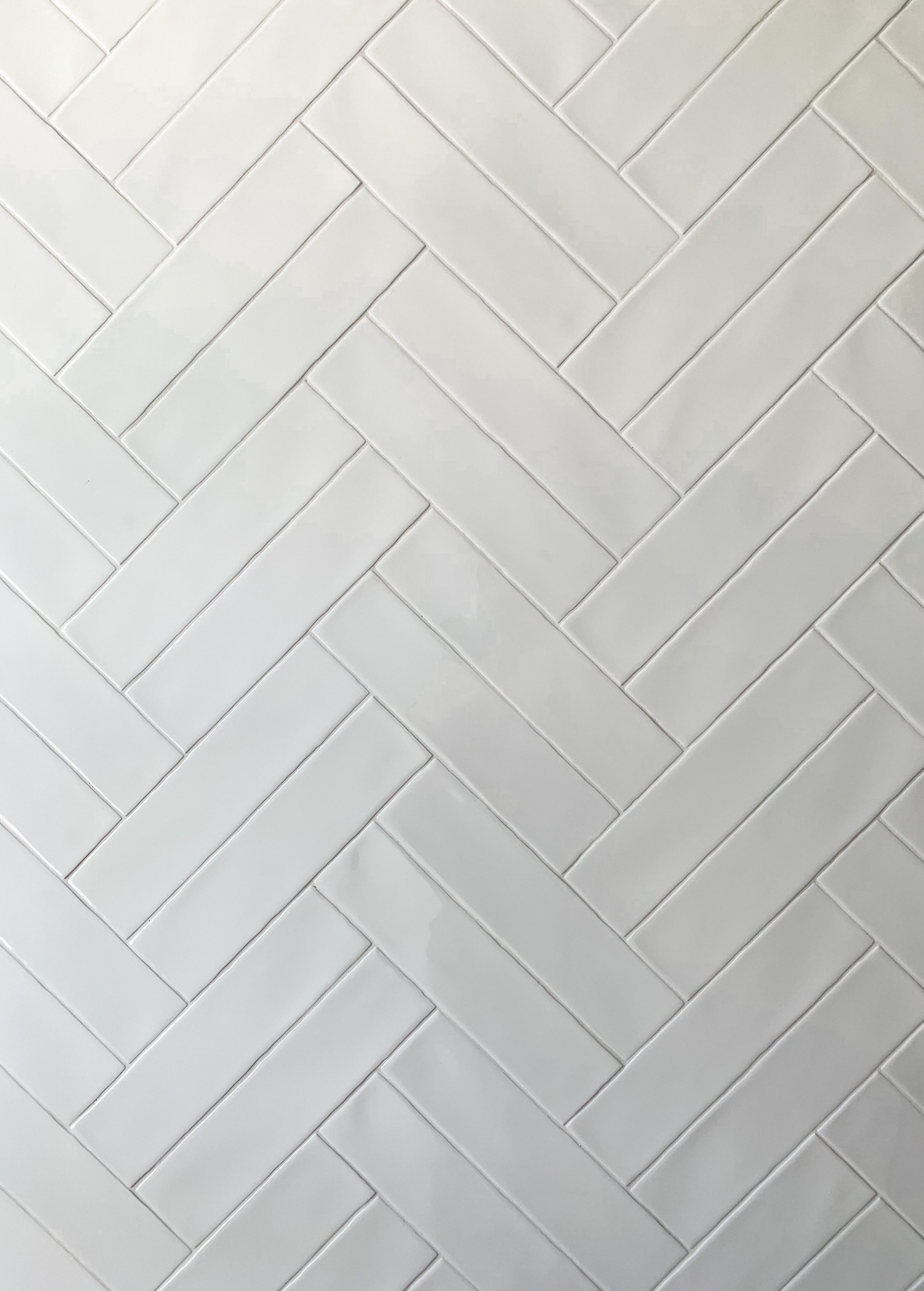 15 White Herringbone Tile Bathroom Ideas With Clean Elegance - 8. Combining Patterns 1